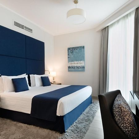 Centara West Bay Hotel & Residences Doha Extérieur photo Deluxe room
